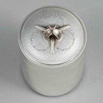 A Georg Jensen silver cigarette box, designed by Oscar Gundelach-Pedersen, Copenhagen, 1928, with import marks for George Stockwell for Stockwell & Co Ltd, London, 1929