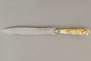 A Victorian silver knife, Atkin Brothers, Sheffield, 1887, fitted with a Japanese carved ivory handle, Meiji period (1868-1912)