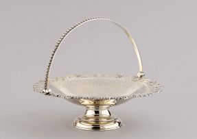 A Victorian silver swing-handled basket, Albert Henry Thompson, Sheffield, 1898, retailed by Manoah Rhodes & Sons