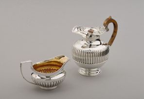 A Victorian silver hot water jug, Goldsmiths & Silversmiths Co Ltd, London, 1896