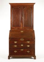 A George III oak bureau bookcase