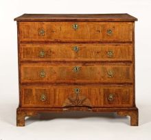 A walnut veneered secretaire chest-of-drawers, 18th century