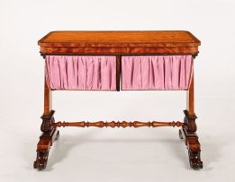 A Victorian satinwood and rosewood library work table