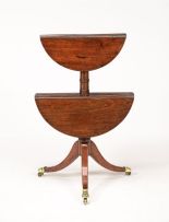 A George III mahogany two-tiered drop-leaf table