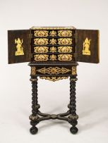 An ebonised porcelain- and brass-mounted cabinet-on-stand, late 19th century