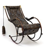 A Victorian steel and brass rocking chair, attributed to RW Winfield, circa 1851