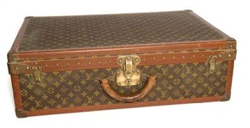 A Louis Vuitton Alzer suitcase in monogram canvas, 20th century