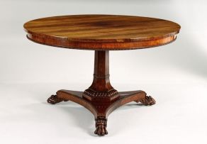 A Regency rosewood tilt-top dining table