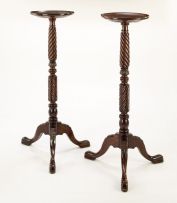A pair of mahogany torchères, late 19th century