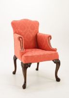 A George II mahogany wing-back armchair
