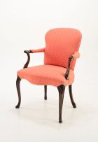 A George III mahogany and upholstered open armchair