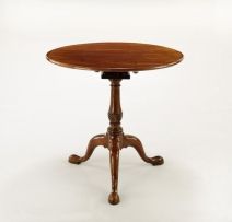 A George III mahogany tilt-top birdcage tripod table