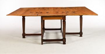 A Cape yellowwood and stinkwood peg-top gate-leg table, late 18th/early 19th century