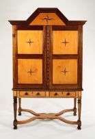 A Cape Transitional stinkwood and yellowwood cabinet-on-stand, late 18th century