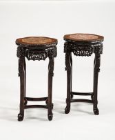 A pair of Chinese hardwood and inlaid table stands, early 20th century