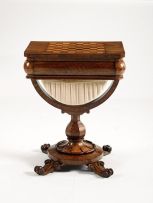 A Victorian walnut and inlaid games and work table