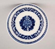 A Chinese blue and white saucer, Qing Dynasty, 19th century