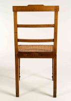 An assembled set of ten Cape stinkwood 'Kerkstoel' chairs, early 19th century