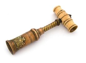 A Victorian brass corkscrew