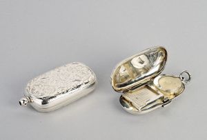 An Edward VII silver stamp and sovereign case, EJ Houlston, Birmingham, 1902