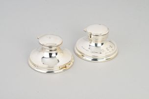 Two Edward VII silver inkwells with stamp compartments, Saunders & Shepherd, Birmingham, 1907 and 1910