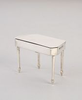 An Edward VII silver novelty double compartment stamp box in the form of a table, Saunders & Shepherd, Chester, 1909