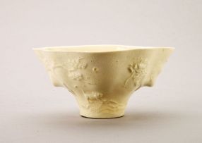 A Chinese Dehua Blanc de Chine libation cup, Qing Dynasty, late 18th/early 19th century