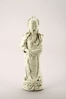 A Chinese Dehua blanc-de-chine figure of an Immortal, Qing Dynasty