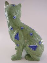 An early 20th Century French Mosanic earthenware figure of a cat, in the 