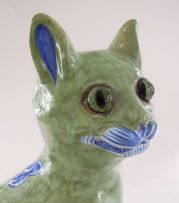 An early 20th Century French Mosanic earthenware figure of a cat, in the 
