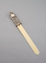 An Edward VII silver-mounted ivory page turner, Goldsmiths and Silversmiths Co Ltd, London, 1906