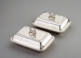 A pair of Sheffield plated entrée dishes and covers, circa 1820
