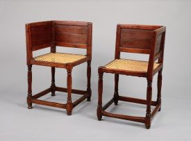 A pair of Cape teak and caned corner chairs, 18th century