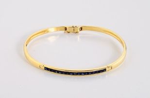 Sapphire and 18ct gold double-hinged bangle