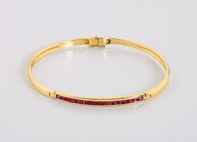 Ruby and 18ct gold double-hinged bangle