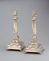 A pair of Russo-Polish silver candlesticks, mark for FC and Izrael Szekman, Moscow, 1908-1926