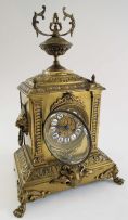 A French brass mantle clock, late 19th Century