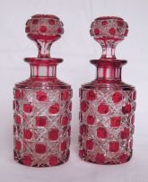 Two Bohemian ruby-overlaid and glass scent bottles, circa 1900
