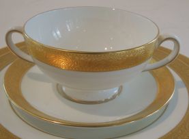 A Wedgwood 'Ascot' pattern white and gilt part dinner service