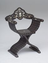 An Italian ebonized and bone-inlaid Savonarola armchair, 19th century