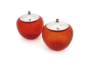 A pair of orange glass jars and associated silver covers, Hamilton & Co, Calcutta, 19th/20th century