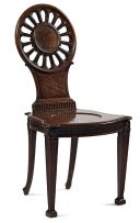 A George III style oak hall chair, early 19th century