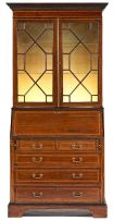 An Edwardian mahogany and inlaid secretaire bookcase