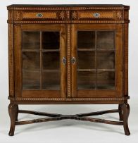 A Cape stinkwood and yellowwood inlaid display cabinet, 19th century