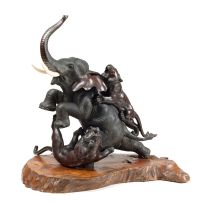 A Japanese bronze figure of an elephant, Meiji period (1868-1912) in the style of Genryusai Seiya and signed Tsunemitsu
