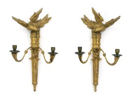 A pair of Regency style giltwood two-light wall sconces, 19th century