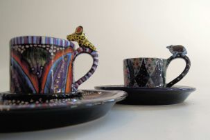 Ardmore Ceramic Studio; Tortoise and Leopard Cups and Saucers, two