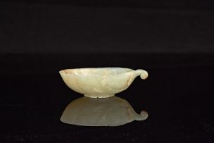 A Chinese pale celadon jade brush washer, late 19th/early 20th century