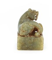 A Chinese mottled green jade seal, 20th century