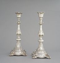 A pair of silver-plate Sabbath candlesticks